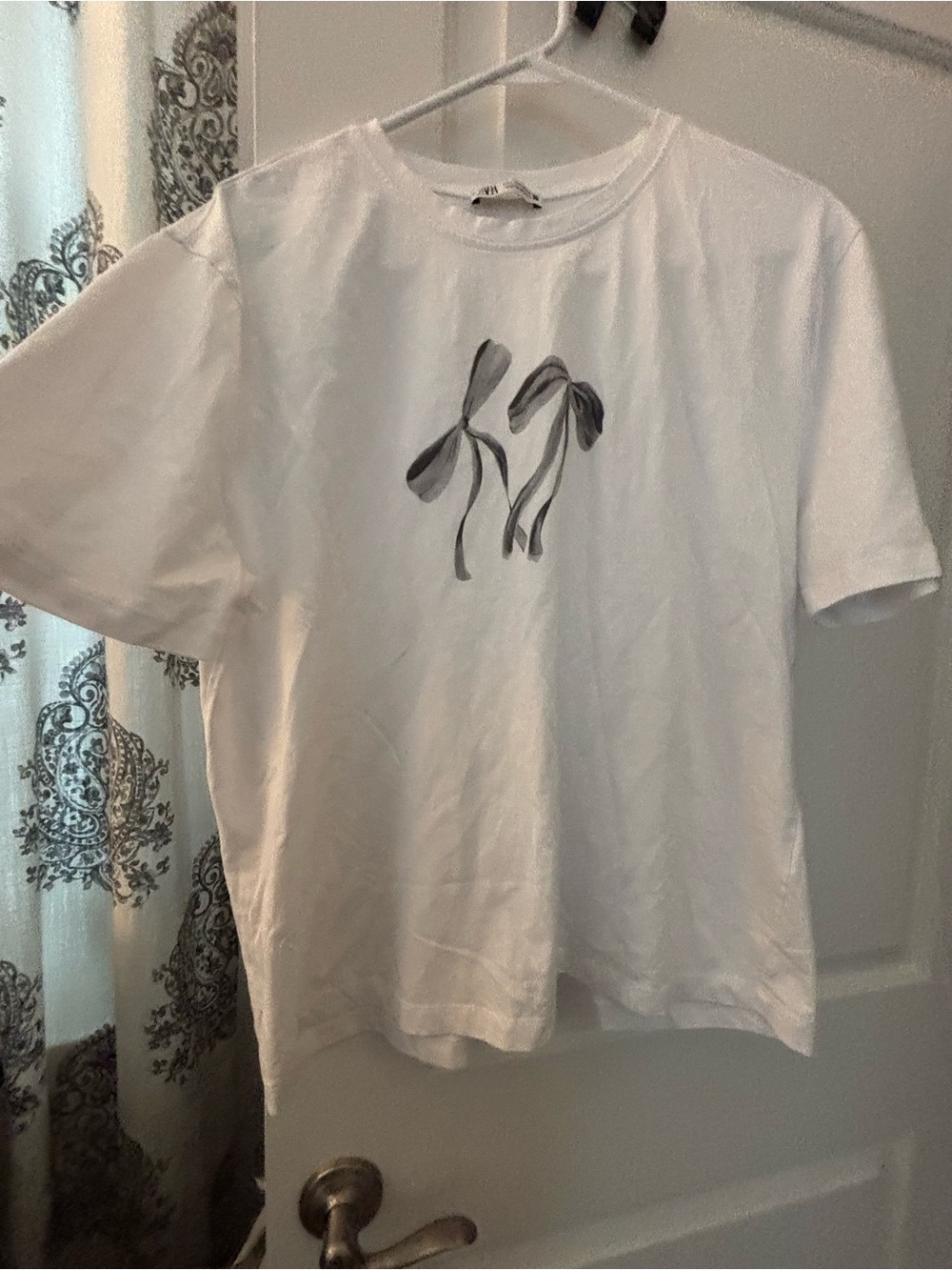 White Bow Graphic Tee with Ribbon Print